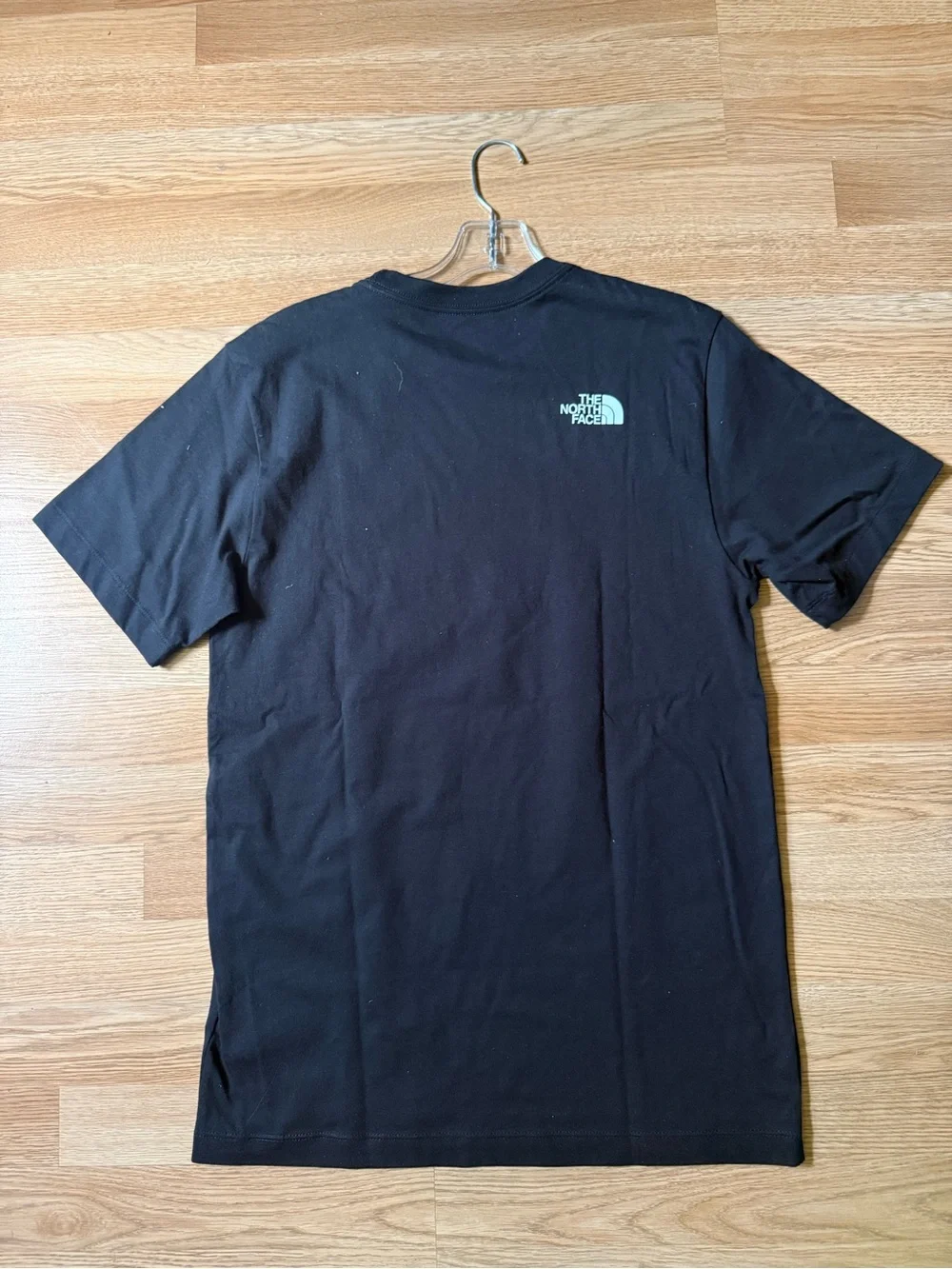 The North Face Black Short-Sleeve Tee with Blue Globe Graphic
